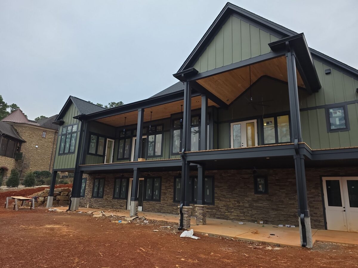 Green board and batten siding on luxury home