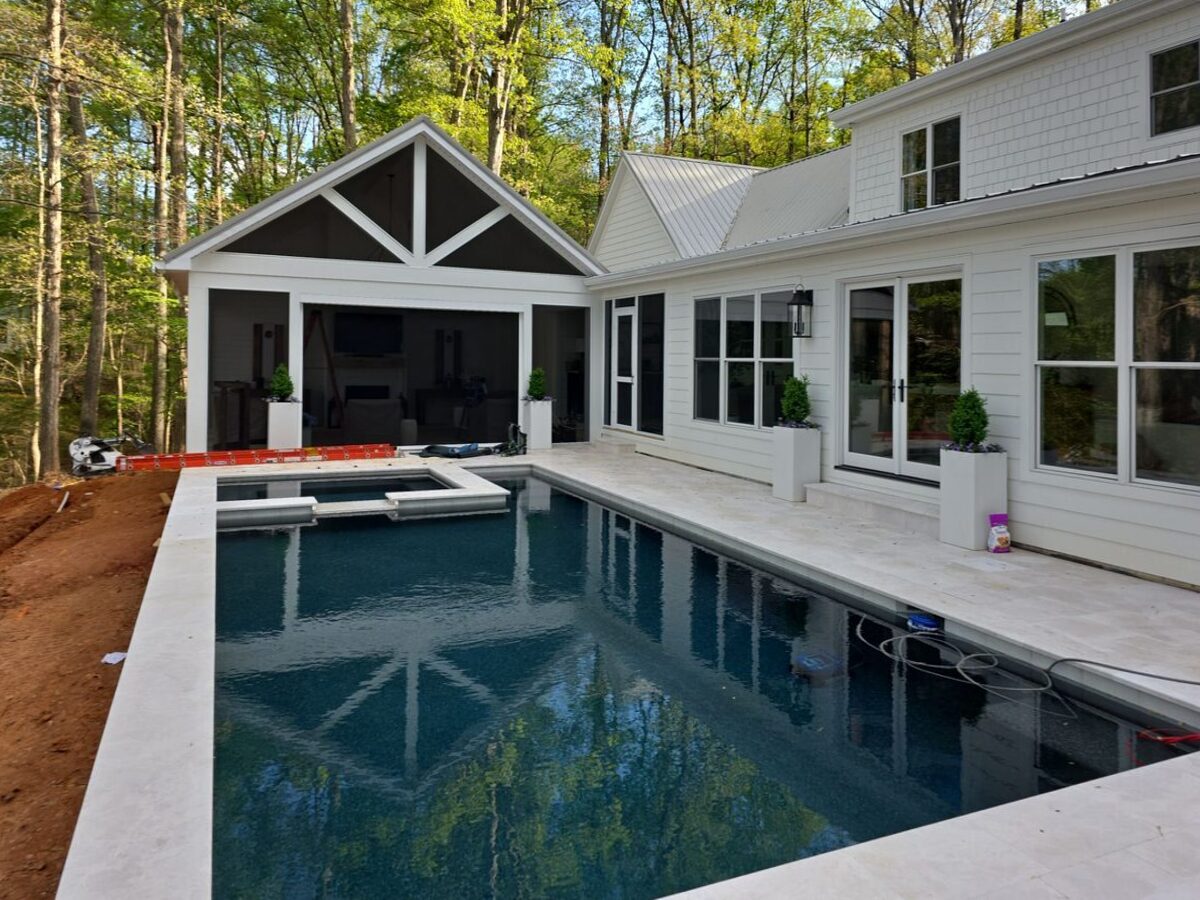 Luxury home addition with pool and covered porch